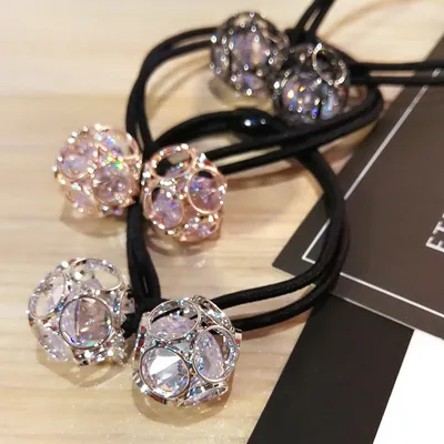Korean version of hair accessories headdress Dongdaemun new alloy zircon hair ring hollow head rope double ball rubber band hair rope mixed batch
