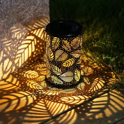 Outdoor solar garden lamp hollow wall hanging leaf projection lamp