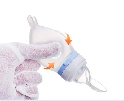 Rice Cereal Spoon Milk Bottle Baby Squeeze Feeding Artifact