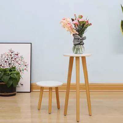 Simple Round Leg Craft Flower Stand On Wooden Balcony
