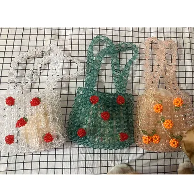 Fashionable acrylic orange bubble bead string handbag