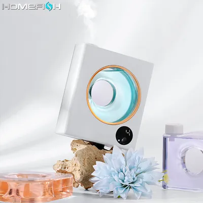 جهاز صغير أوتوماتيكي للعلاج بالروائح العطرية، يُثبت على الحائط، مناسب للاستخدام المنزلي والفندقي، مع موزع بخور قابل للشحن وبخاخ للزيوت العطرية.