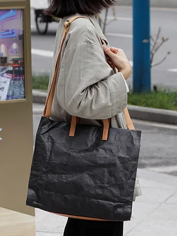 Stylish and eco-friendly paper handbags and checked bags
