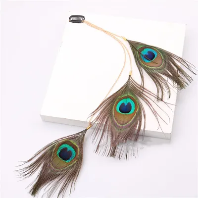 Handmade peacock feather hair accessory