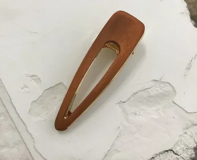 Various geometric hollow hair clips made of wood