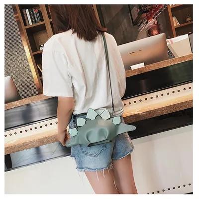 Female dinosaur shoulder bag