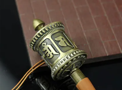 Buddhist supplies hand-cranked prayer wheels