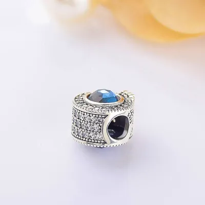 Brilliant pavé beads sparkling blue crown letter O charm