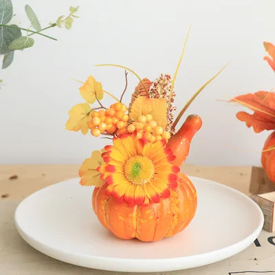Pumpkin decoration and maple leaf props
