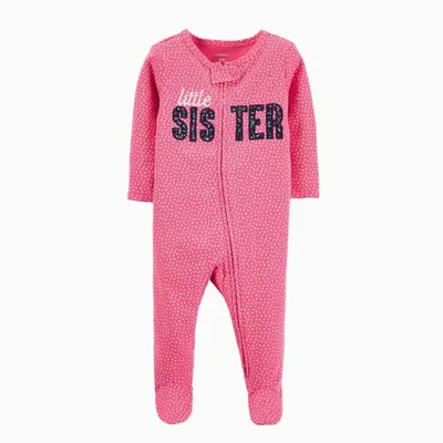 A baby onesie with legs wrapped around it
