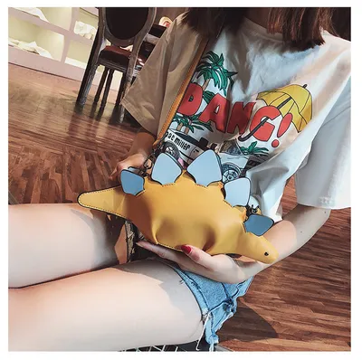 Female dinosaur shoulder bag