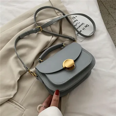 حقيبة كتف صغيرة مربعة الشكل
