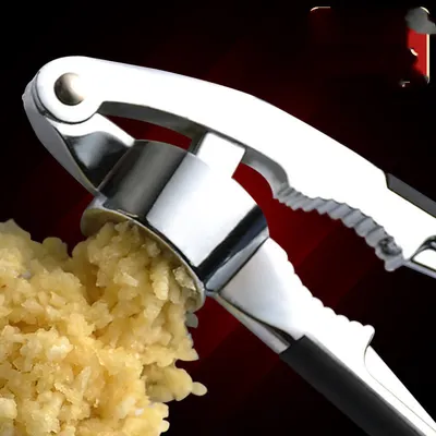 Multifunctional manual pressure garlic zinc alloy clip twist mixing garlic pounder garlic mashed garlic for stainless steel kitchen tools.