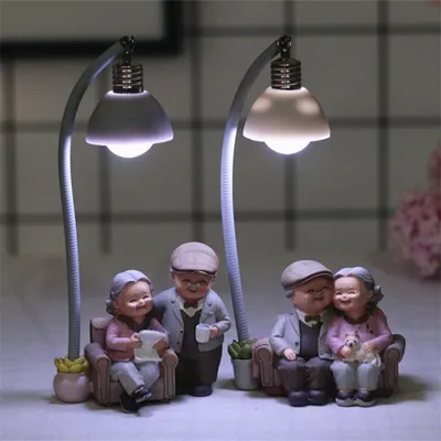 Grandma decorates the cake with a small night light