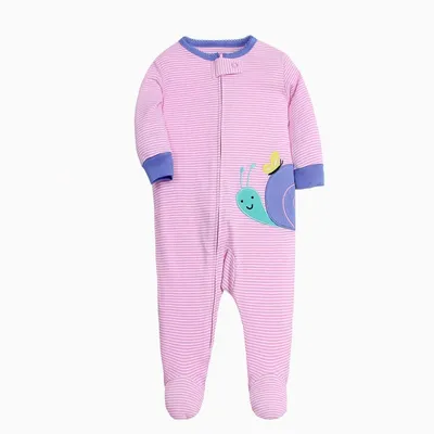 A baby onesie with legs wrapped around it
