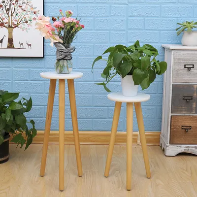 Simple Round Leg Craft Flower Stand On Wooden Balcony
